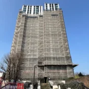 Apology over inside-out windows on tower blocks
