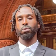 Rapper to face trial over Tommy Robinson video