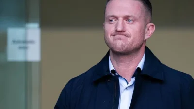 Tommy Robinson denies refusing to leave antisemitism march in London