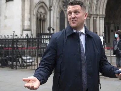 Tommy Robinson fined after failing to turn up at High Court finances hearing