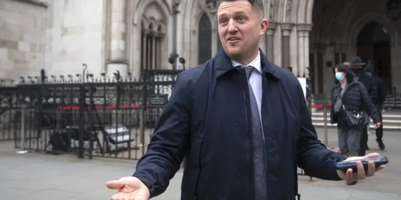 Tommy Robinson fined after failing to turn up at High Court finances hearing